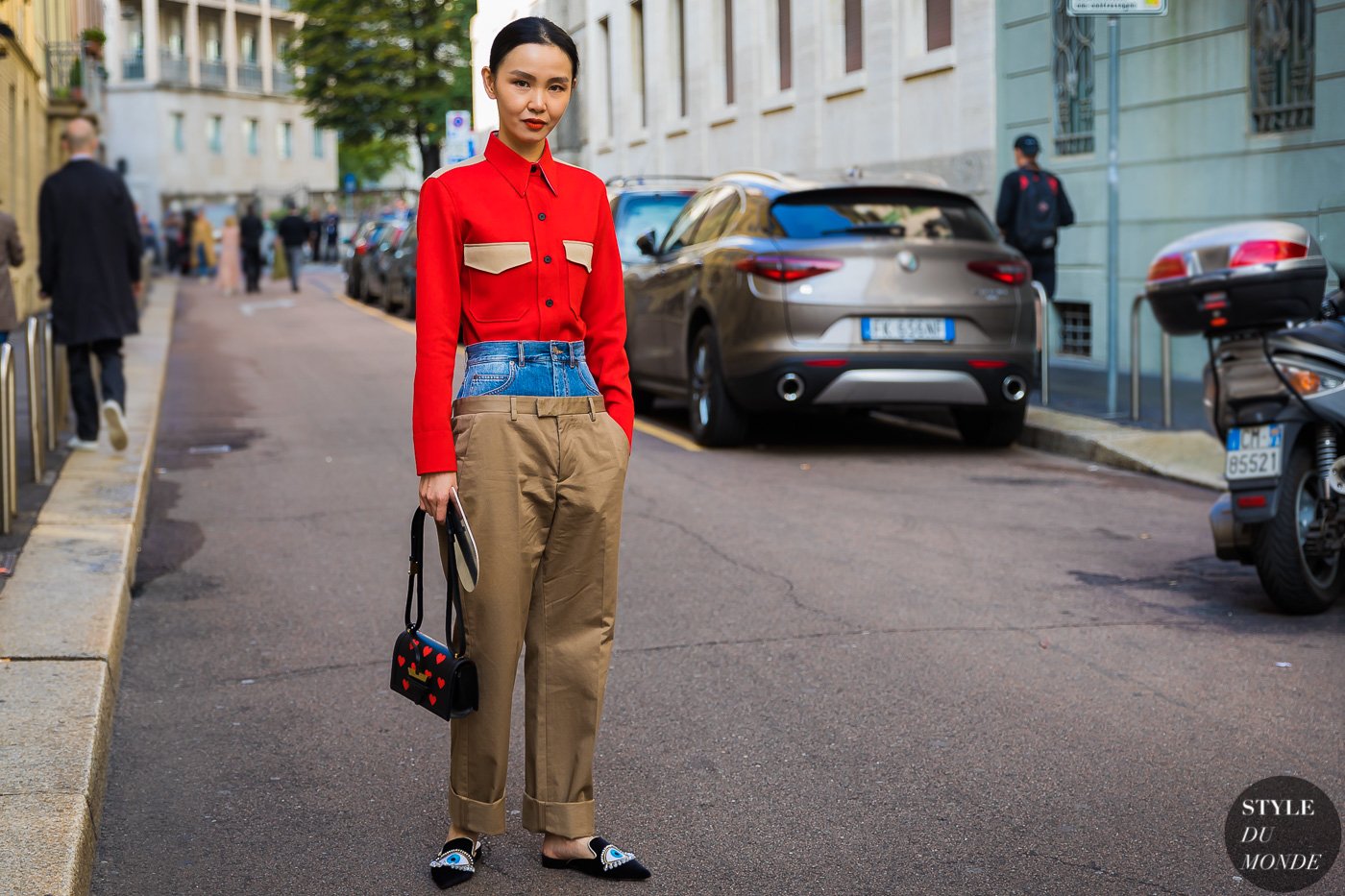 Sherry Shen wearing a Calvin Klein shirt, Margiela pants and a Loewe bag